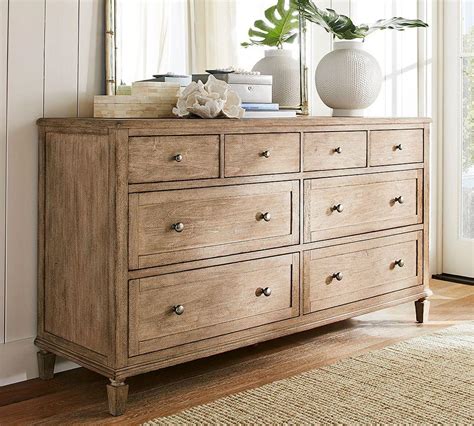 Recessed paneling, square block posts and brushed nickel drawer pulls add the. . Dresser pottery barn